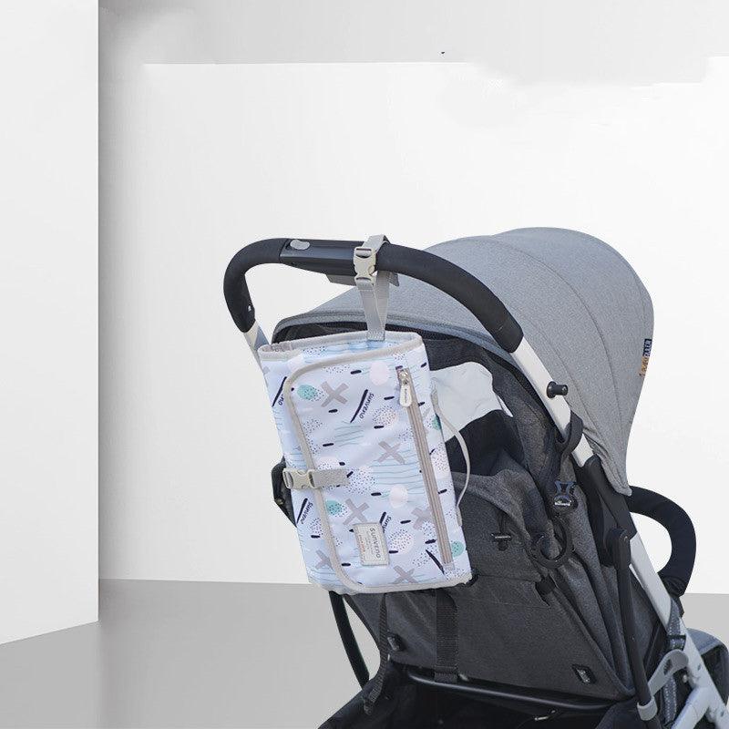 Convenient Diaper Changing On-the-Go: Portable Storage Bag with Changing Pad for Babies