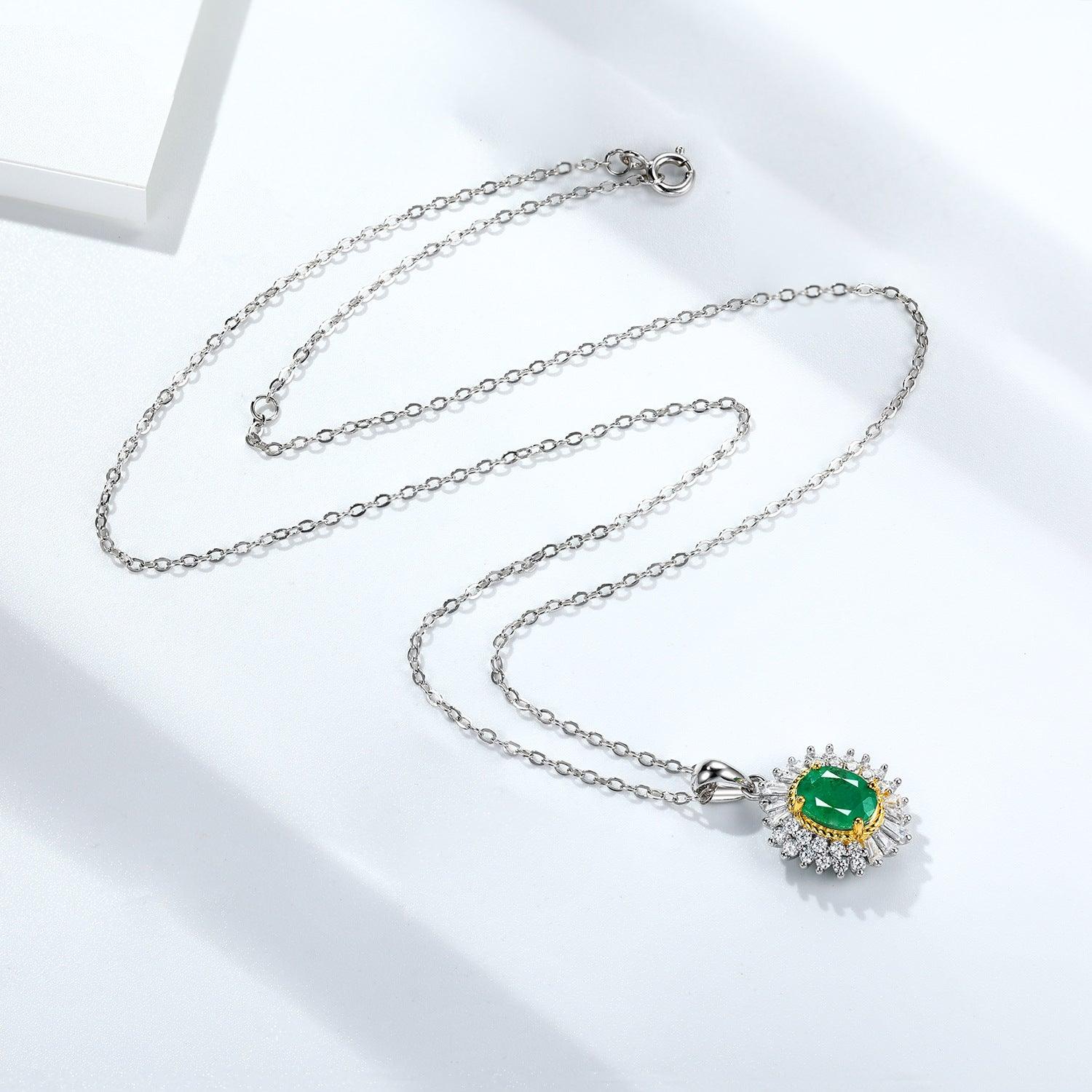Exquisite Natural Emerald Pendant: S925 Silver Chain with Unique Feminine Design