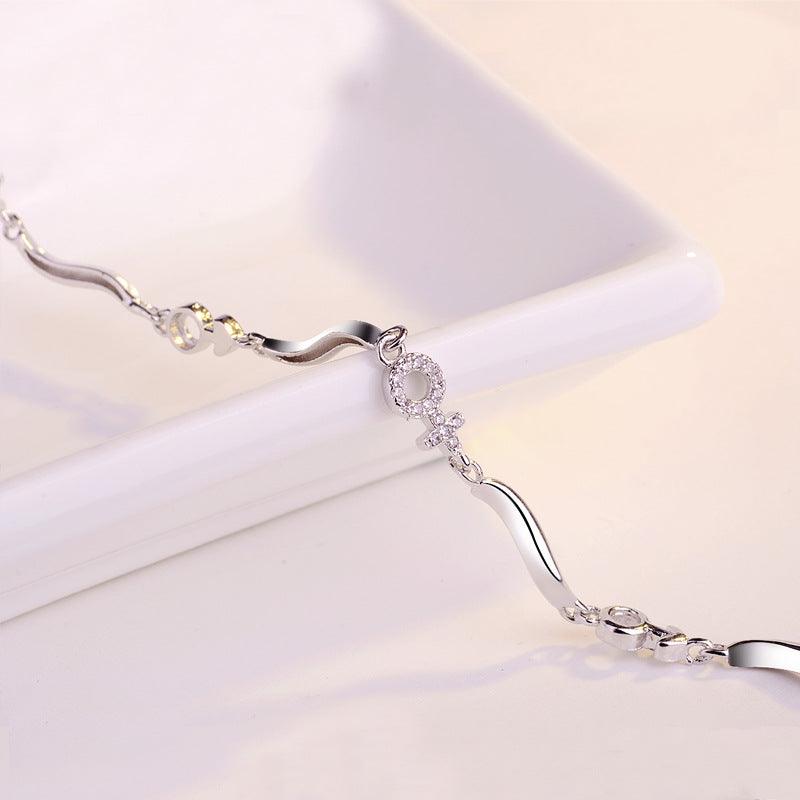 Eternal Bond: 925 Silver Bracelet with Girl Symbol Pendant and Bright White Gem Stones